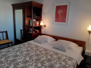 Postel nebo postele na pokoji v ubytování Apartman Lori