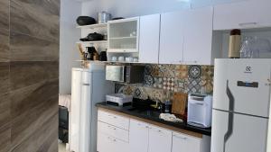 Kuchyň nebo kuchyňský kout v ubytování Casa de praia na Linha Verde - Beira-mar