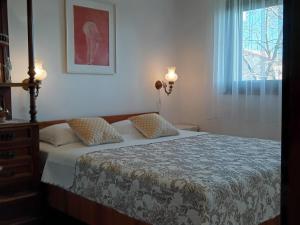 Postel nebo postele na pokoji v ubytování Apartman Lori