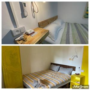 een kleine kamer met een bed en een houten tafel bij Kowlessur Residence in Surinam