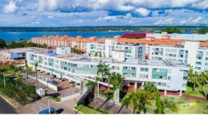 an aerial view of a large white building at Premier Residence in Brasília