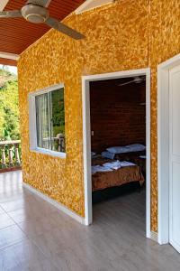 Postel nebo postele na pokoji v ubytování Hotel Campestre La Francesina
