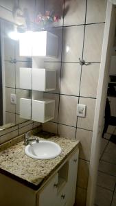Et badeværelse på Apartamento Bem Localizado