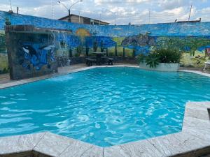 A piscina localizada em CONFORT HOTEL ARAPIRACA ou nos arredores