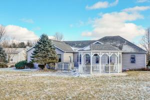 a white house with a gazebo at Elegant Pataskala Home with Hot Tub and Fire Pit! in Pataskala