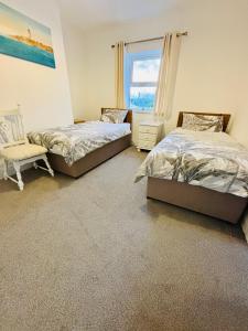 Voodi või voodid majutusasutuse The Townhouse Dungloe toas