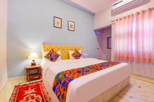 Voodi või voodid majutusasutuse The Boho Udaipur toas