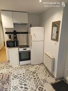 Η κουζίνα ή μικρή κουζίνα στο Appartement avec Terrasse