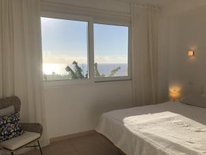 Posteľ alebo postele v izbe v ubytovaní Vivienda Atlantico
