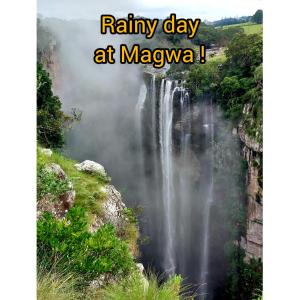 a waterfall on a rainy day at mayaya at Louis at Magwa Falls in Lusikisiki