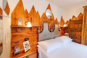 Postel nebo postele na pokoji v ubytování Hotel&Restaurant Armanac de Toubïe