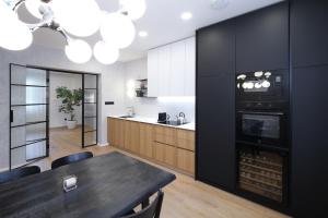 Kuchyň nebo kuchyňský kout v ubytování Apartmány Vila Terasy