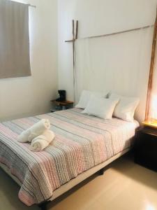 Кровать или кровати в номере Casa Ohana By Utopia