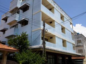 a white building with balconies on it at J Hotel2 in Ao Nang Beach