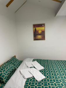 Säng eller sängar i ett rum på Yugoslavija 2 centar