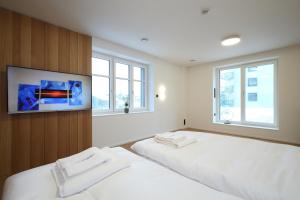 Postel nebo postele na pokoji v ubytování Apartmány Vila Terasy