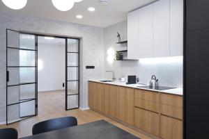 Kuchyň nebo kuchyňský kout v ubytování Apartmány Vila Terasy