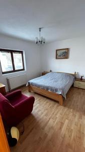 Tempat tidur dalam kamar di Ivković Residence
