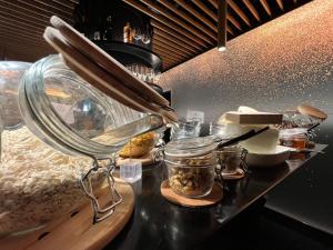a kitchen counter with a mixer and some food at Golden Lisbon Hotel in Lisbon