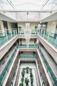 a view of a mall with a chandelier at Breeze Bay Hotel in Seogwipo