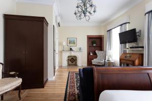TV a/nebo společenská místnost v ubytování Hotel Champlain