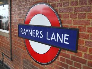 a sign for a ryppers lane on a brick wall at Modern Studio in Rayners Lane Pinner Harrow near wembley Greater London in Pinner