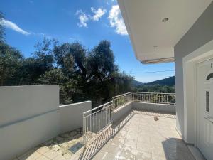 a view from the balcony of a house at Home Apartments in Parga