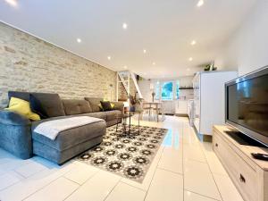 Η κουζίνα ή μικρή κουζίνα στο La sapinière, duplex de charme