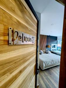 Postel nebo postele na pokoji v ubytování Habitacion Deluxe 2 con Jacuzzi a 20 mt del parque