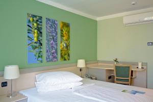 Кровать или кровати в номере Hotel Kimen - Annex