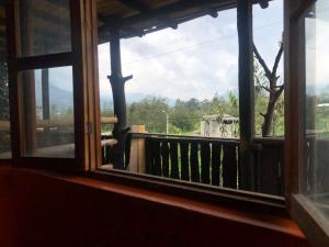 a window with a view of a mountain view at Hotel IntyKucha in San Rafael