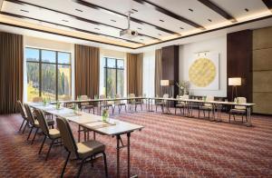 a conference room with long tables and chairs at Viceroy Kopaonik Serbia in Kopaonik +148 photos