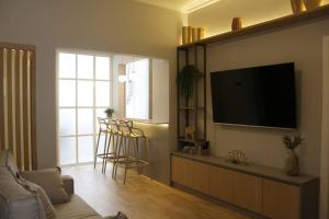 Lindo apartamento em ponto nobre de Ipanema TV 또는 엔터테인먼트 센터