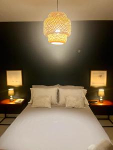 Cama o camas de una habitación en Casa Maravilhosa em Belém!