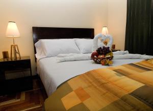 Ένα ή περισσότερα κρεβάτια σε δωμάτιο στο Hostal Samichay