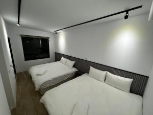 嵐羽蒔光 객실 침대