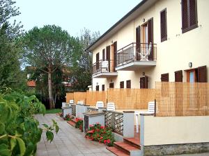 En balkon eller terrasse på L' Oleandro + 16 billeder
