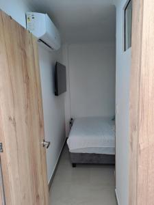 Postel nebo postele na pokoji v ubytování Ultra mini suite privada con baño