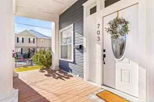 a front door of a house with a wreath on it at Reduced! Pearl Townhomes Combined. Sleeps 16 in San Antonio