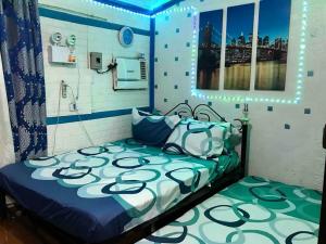 Gallery image of MG 10pax 2 AC BR Videoke FREE Parking Netflix Cook Shower Heater Grill in Rodriguez