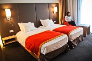 Krevet ili kreveti u jedinici u okviru objekta Hotel de la Source