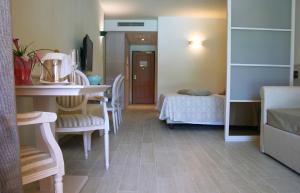 Кровать или кровати в номере Hotel Marana