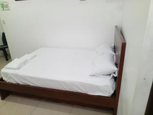 Ліжко або ліжка в номері HOTEL LA POSADA DEL FRAILE MONTAÑITA
