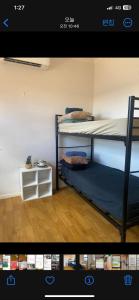 Postel nebo postele na pokoji v ubytování Tomato Backpackers