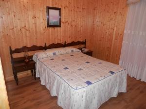 Postel nebo postele na pokoji v ubytování Pension Restaurante Cantábrico