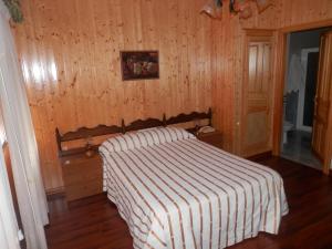 Postel nebo postele na pokoji v ubytování Pension Restaurante Cantábrico