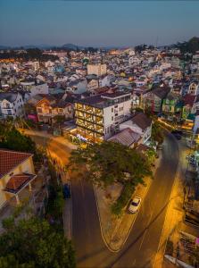 an overhead view of a city with a street at Le House DaLat in Da Lat