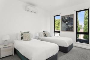 Boutique Stays - Milk & Honeyにあるベッド