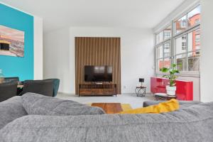 TV a/nebo společenská místnost v ubytování MARLEI 6 Apartment mit 3 Schlafzimmern, gemütlichen Wohnbereich, mit 2 WCs