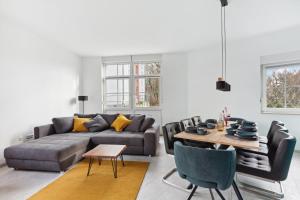 Posezení v ubytování MARLEI 6 Apartment mit 3 Schlafzimmern, gemütlichen Wohnbereich, mit 2 WCs